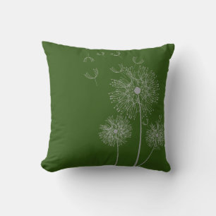 Dandelion flower on olive cushion