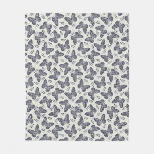 Dark blue butterfly pattern on grey background fleece blanket