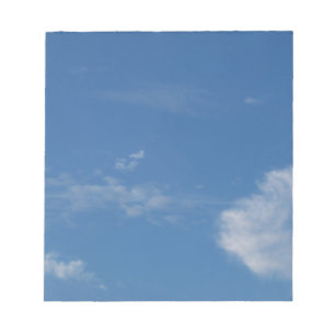 dark blue sky white clouds notepad