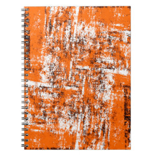 Dark brown grunge background. Black white orange o Notebook
