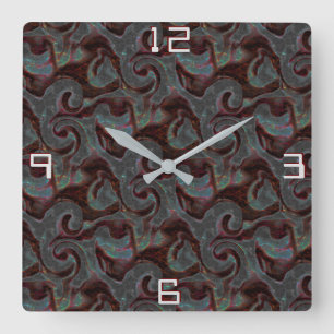 Dark coloured carved spiral parts and strokes square wall clock
