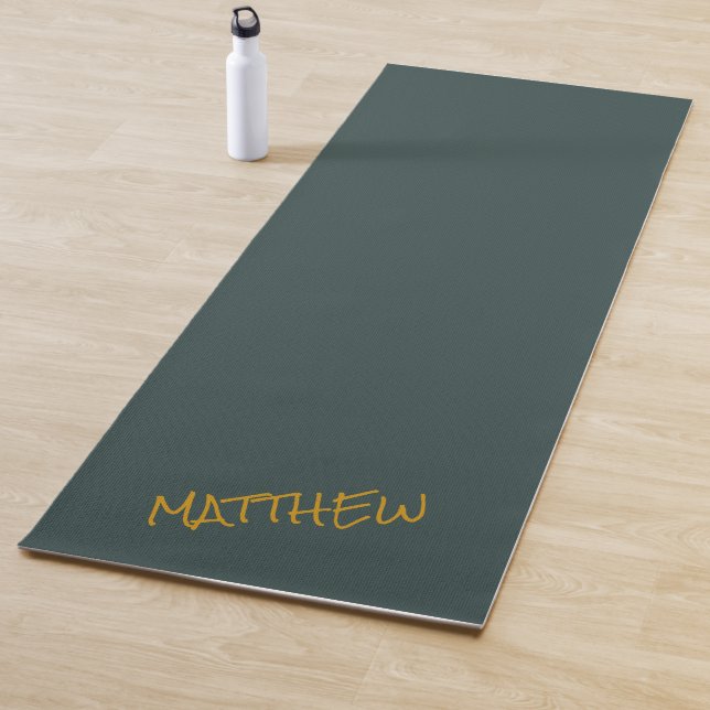 Dark green modern gold lettering script yoga mat (In Situ)