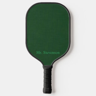 Dark green textured pickleball paddle