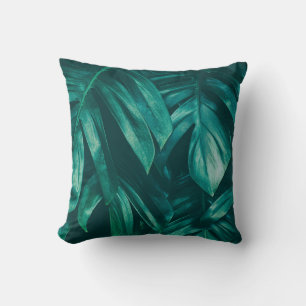Dark green, tropical jungle foliage. cushion