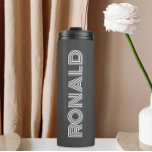 Dark Grey Modern Typography Personalised Thermal Tumbler<br><div class="desc">Keep hot beverages hot and cold beverages cold with this trendy,  insulated thermal tumbler that is a dark grey colour along with name printed in white,  modern typography. Edit your thermal tumbler and replace name with desired name. Perfect for a birthday gift,  wedding groomsman gift,  etc.</div>