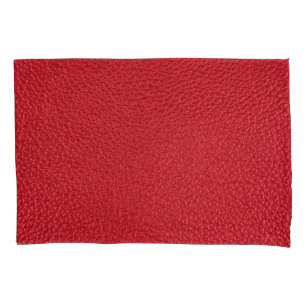 Dark red artificial leatherette closeup. pillowcase