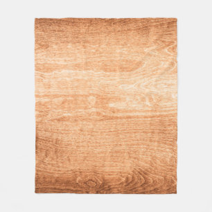 Dark wood texture background surface with old natu fleece blanket