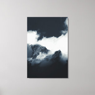 Darkness and mountains wrapped in clouds canvas print