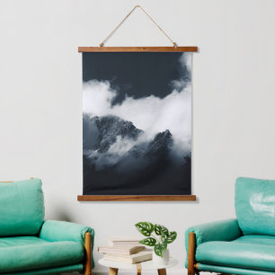 Darkness and mountains wrapped in clouds hanging tapestry