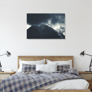 Darkness and storm clouds over mountains canvas print