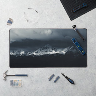 Darkness and sunlight at mountain Triglav Desk Mat
