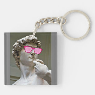 David wears rose coloured glasses keychain