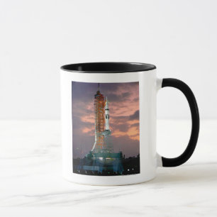 Dawn breaks behind ASTP Saturn IB CDDT Mug