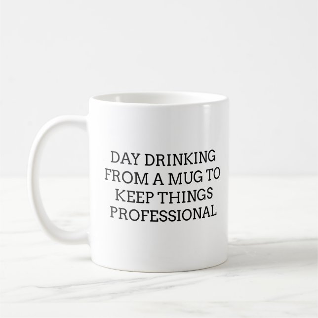 Day drinking from a mug to keep things professiona (Left)