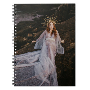dazzling women laying on rocks spiral note book