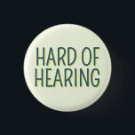 Deafness Basic Green Lettering Hard of Hearing  3 Cm Round Badge<br><div class="desc">Let others know your medical needs with this simple deafness badge by JessicaAmber. This customisable button features the slogan 'Hard of Hearing' in a narrow font, on a pale green background. You can edit the text and colours as needed. ⭐ For more cool medical badges, visit my store Zazzle.com/Elder_Vitality ⭐...</div>