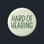 Deafness Basic Green Lettering Hard of Hearing  3 Cm Round Badge<br><div class="desc">Let others know your medical needs with this simple deafness badge by JessicaAmber. This customisable button features the slogan 'Hard of Hearing' in a narrow font, on a pale green background. You can edit the text and colours as needed. ⭐ For more cool medical badges, visit my store Zazzle.com/Elder_Vitality ⭐...</div>