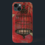 Decorative Birdcage with Butterflies iPhone 13 Case<br><div class="desc">Two pale butterflies hover around a birdcage in this painting by Norman Wyatt. Leaves hang over the birdcage,  and it all rests on a crimson background. Order this print today!</div>