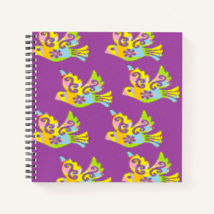 decorative birds on purple notebook