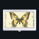 Decorative Butterfly with Wildflowers Business Card Holder<br><div class="desc">A brightly coloured,  decorative butterfly is the subject of this piece by Jennifer Goldberger. Wildflowers are drawn on the sides and underneath the huge butterfly. A lovely pastel border completes the scene. Order your print today!</div>