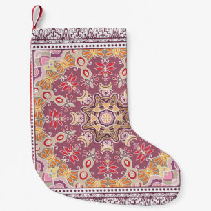 Decorative colorful ornament on white background, small christmas stocking