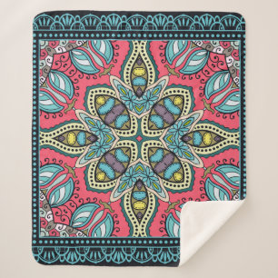 Decorative colourful ornament on a black backgroun sherpa blanket