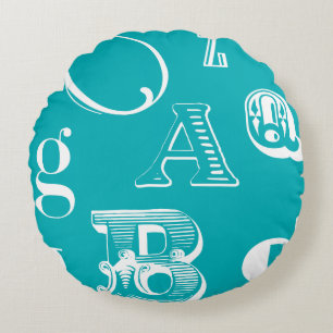 Decorative Letters on Blue Background Round Cushion