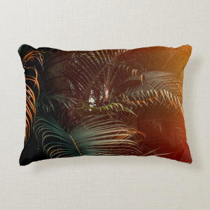 Deep dark green palm leaves pattern with bright or decorative cushion