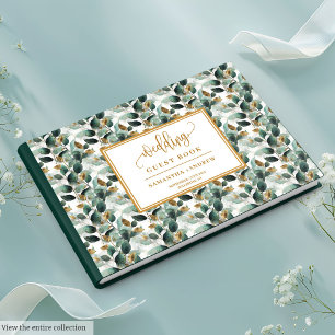 Deep green gold wedding guest book with greenery