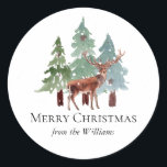 Deer And Snowy Pine Christmas  Classic Round Sticker<br><div class="desc">Snowy pine trees and deer family name Christmas stickers. Customisable!</div>