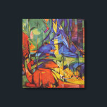 Deer in the Forest II by Franz Marc, Vintage Art Canvas Print<br><div class="desc">Deer in the Forest II (1914) by Franz Marc is a vintage expressionism fine art wild animal painting. Several forest creatures, deer, a stag and a baby doe with spots, lying down in a forest surrounded by trees. A beautiful, bright, colourful background. About the artist: Franz Marc (1880-1916) was a...</div>