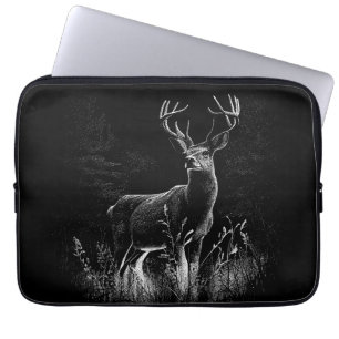 Deer with antlers framed by field and tree      laptop sleeve