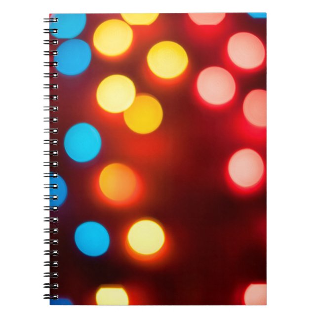 Defocused christmas lights. New Year bokeh. Abstra Notebook (Front)