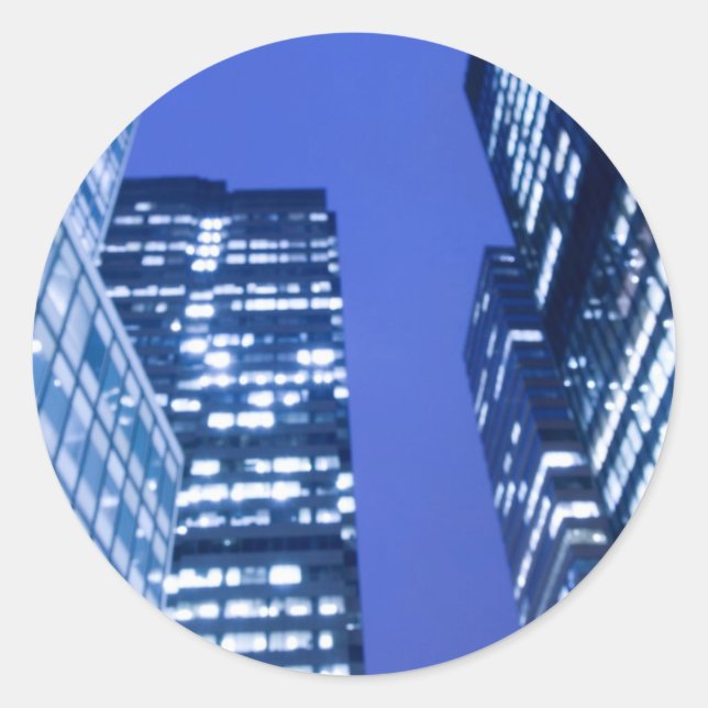 Defocused upward view of office building windows classic round sticker (Front)