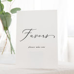 Delicate Black Calligraphy Wedding Favours Pedestal Sign<br><div class="desc">This delicate black calligraphy wedding favours pedestal sign is perfect for a modern wedding. The romantic minimalist design features lovely and elegant black typography on a white background with a clean and simple look.</div>
