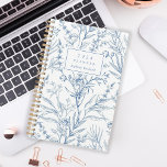Delicate Blue White Floral Pattern Monogram 2024 Planner<br><div class="desc">Personalise this planner with your name in blue italics framed by a white rectangle,  on a delicate botanical pattern of blue line art flowers and foliage on a white background.</div>