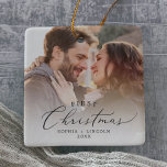 Delicate First Christmas Couples Keepsake Photo Ceramic Ornament<br><div class="desc">This delicate first Christmas couples keepsake photo ceramic ornament is the perfect modern Christmas tree decoration. The romantic minimalist design features lovely and elegant black typography with a clean and simple look. Personalize your double-sided keepsake ornament with a photo,  your names and the year.</div>