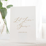 Delicate Gold Calligraphy Let Love Grow Favour Pedestal Sign<br><div class="desc">This delicate gold calligraphy let love grow favour pedestal sign is perfect for a modern wedding. The romantic minimalist design features lovely and elegant champagne golden yellow typography on a white background with a clean and simple look.</div>