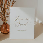 Delicate Gold Calligraphy Love Is Sweet Wedding Pedestal Sign<br><div class="desc">This delicate gold calligraphy love is sweet wedding pedestal sign is perfect for a modern wedding. The romantic minimalist design features lovely and elegant champagne golden yellow typography on a white background with a clean and simple look.</div>
