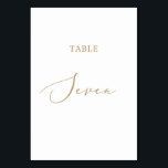 Delicate Gold Calligraphy Table Seven Table Number<br><div class="desc">This delicate gold calligraphy table seven table number is perfect for a modern wedding. The romantic minimalist design features lovely and elegant champagne golden yellow typography on a white background with a clean and simple look. The card prints on the front and back (double-sided). Other table numbers in the collection...</div>