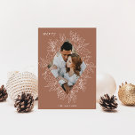 Delicate Holly | Elegant Photo Holiday Card<br><div class="desc">A modern and elegant holiday card that frames your vertical or portrait oriented photo in a beautifully detailed diamond shaped frame with holly leaves, berries, and winter leaves on a rich earth toned cinnamon brown background. "MERRY" appears at the top left, with your family name along the bottom. The year...</div>