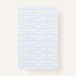 Delicate, light-blue patterned design repeating on ID badge
