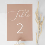 Delicate Muted Peach Beige Minimalist Wedding Table Number<br><div class="desc">This elegant wedding table number card features a soft muted peach beige background, accented by delicate white script and clean numbering. The gentle pinkish tan tone gives it a romantic and modern look - ideal for spring or fall weddings, blush toned palettes, or minimalist celebrations. With its subtle, warm colouring...</div>