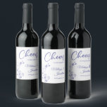 Delicate orchid cheers to wedding purple custom<br><div class="desc">Elegant customisable wine labels for your wedding reception, featuring beautiful and delicate periwinkle purple orchids line drawing on one side, over a classic white background, and the wording "Cheers to the wedding of" in purple fonts. Easily edit the template fields to add the bride and groom names in a classy...</div>