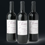 Delicate orchid cheers to wedding purple custom wine label<br><div class="desc">Elegant customisable wine labels for your wedding reception, featuring beautiful and delicate pastel purple orchids line drawing on one side, over a classic white background, and the wording "Cheers to the wedding of" in purple fonts. Easily edit the template fields to add the bride and groom names in a classy...</div>