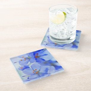 delicate purple flowers with orange glass coaster