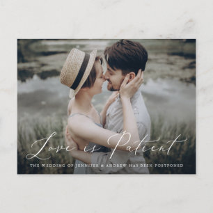 Delicate Script Love is Patient Change the Date Announcement Postcard