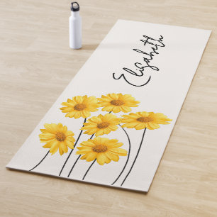 Delicate yellow flowers with long stems  yoga mat