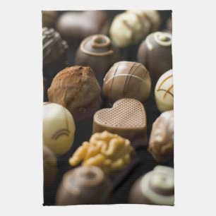 Delicious chocolate pralines tea towel