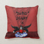 Demon Hunter Goth Red Scary 16th Birthday Cushion<br><div class="desc">Crimson red metal look with a parched folded paper overlay and a chain mail band with a black winged demon hunter on a cloud complete with a sword. Perfect for a teens 16th birthday.</div>